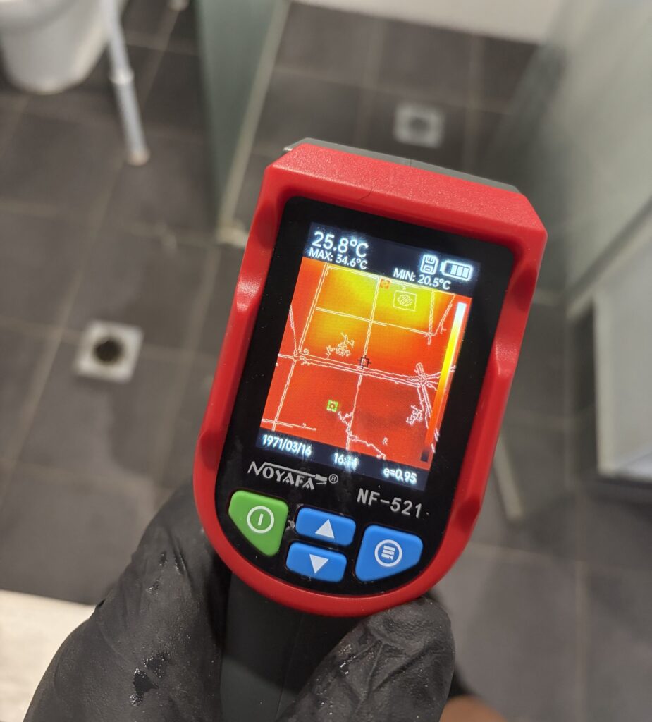 Shower leak detection tool measuring moisture behind tiles